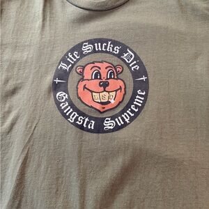 Supreme "Life Sucks” tee in olive